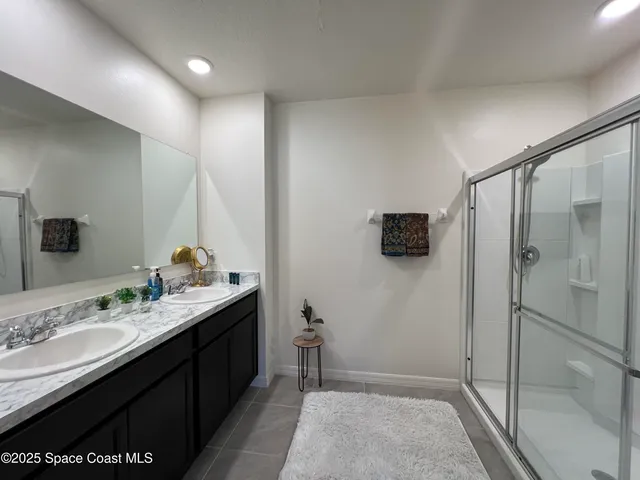 a bed room with a bed and a tv