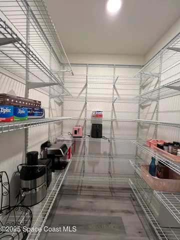 a white refrigerator freezer sitting inside of a kitchen