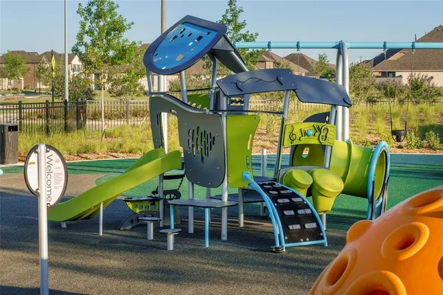a bathroom with double vanity sinks a mirror and a shower