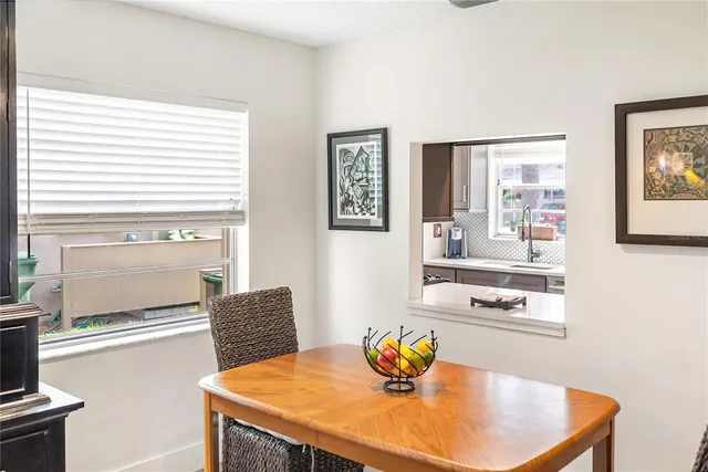 a view of a dining room with furniture