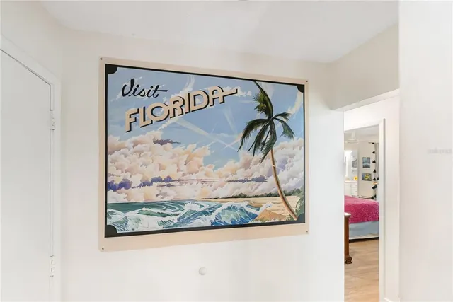 a bedroom with a bed and a table in it