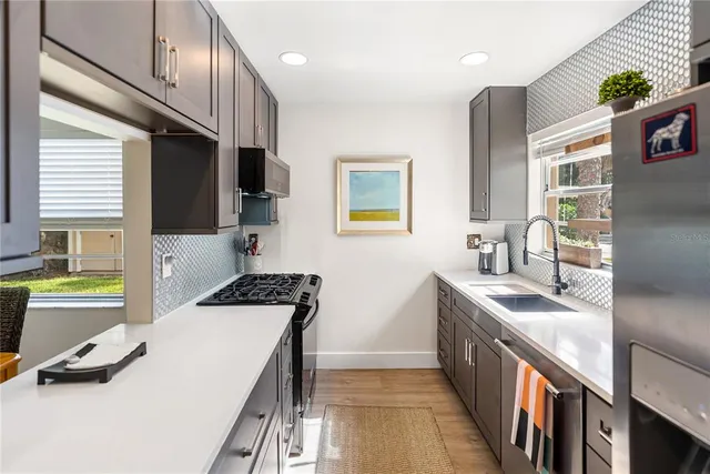 a bedroom with furniture and a flat screen tv