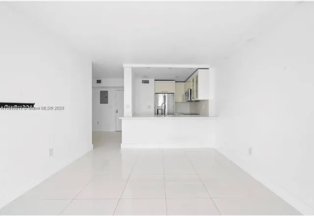 a view of a kitchen with a sink