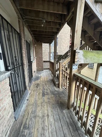 a view of deck with wooden floor and seating space