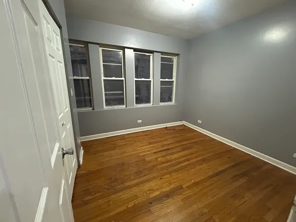 a view of empty room with a window