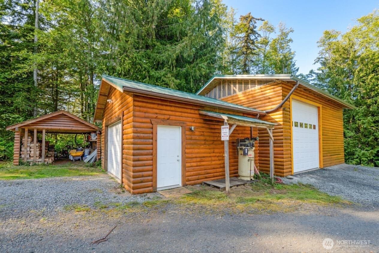 134 Bishop Road Port Angeles, WA 98363 - Photo 27 of 38 a view of a house with a backyard