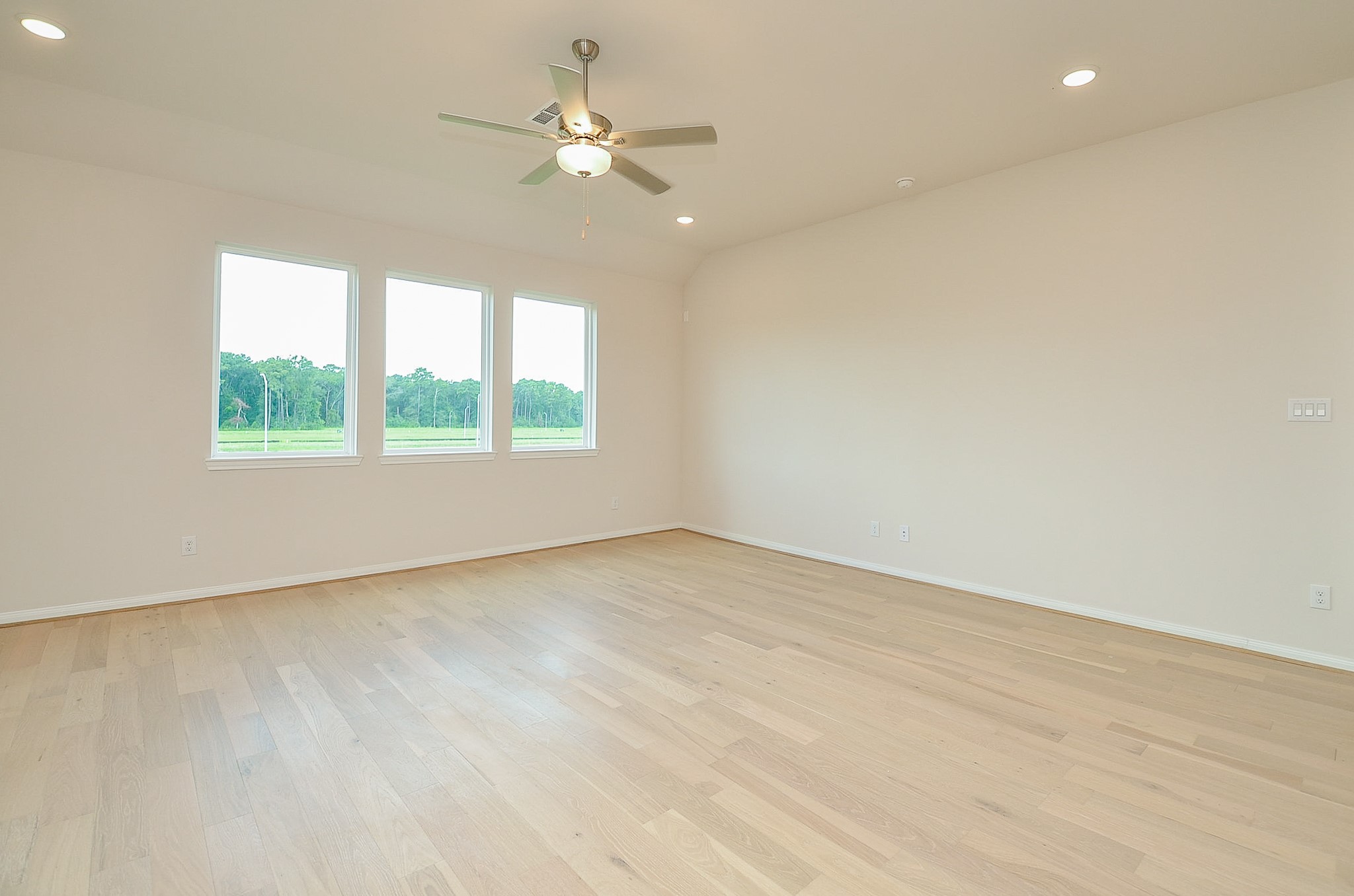 20637 Dynamic Court Humble, TX 77338 - Photo 10 of 32 an empty room with windows and fan