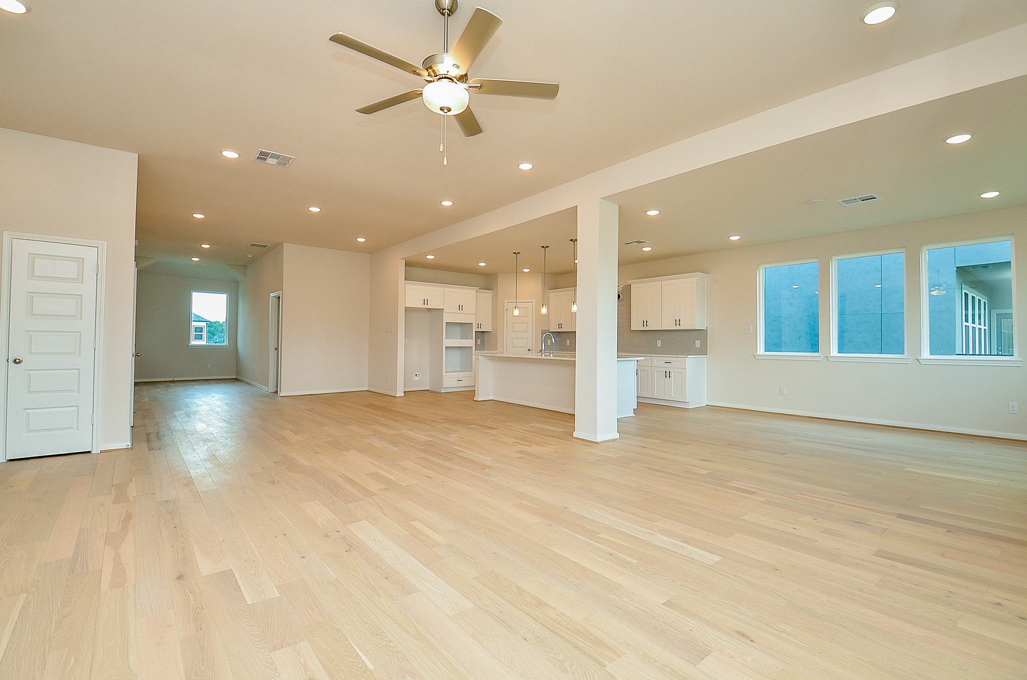 20637 Dynamic Court Humble, TX 77338 - Photo 32 of 32 a view of an empty room with a kitchen