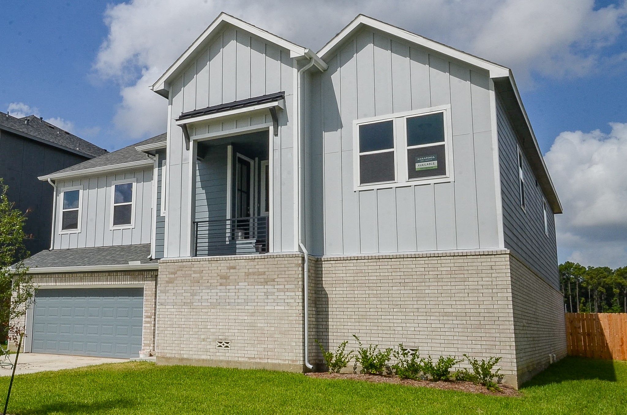 20637 Dynamic Court Humble, TX 77338 - Photo 2 of 32 a front view of a house with garden