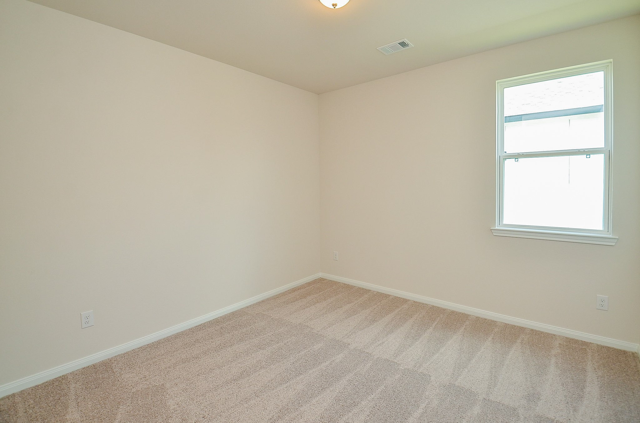 20637 Dynamic Court Humble, TX 77338 - Photo 21 of 32 an empty room with a window
