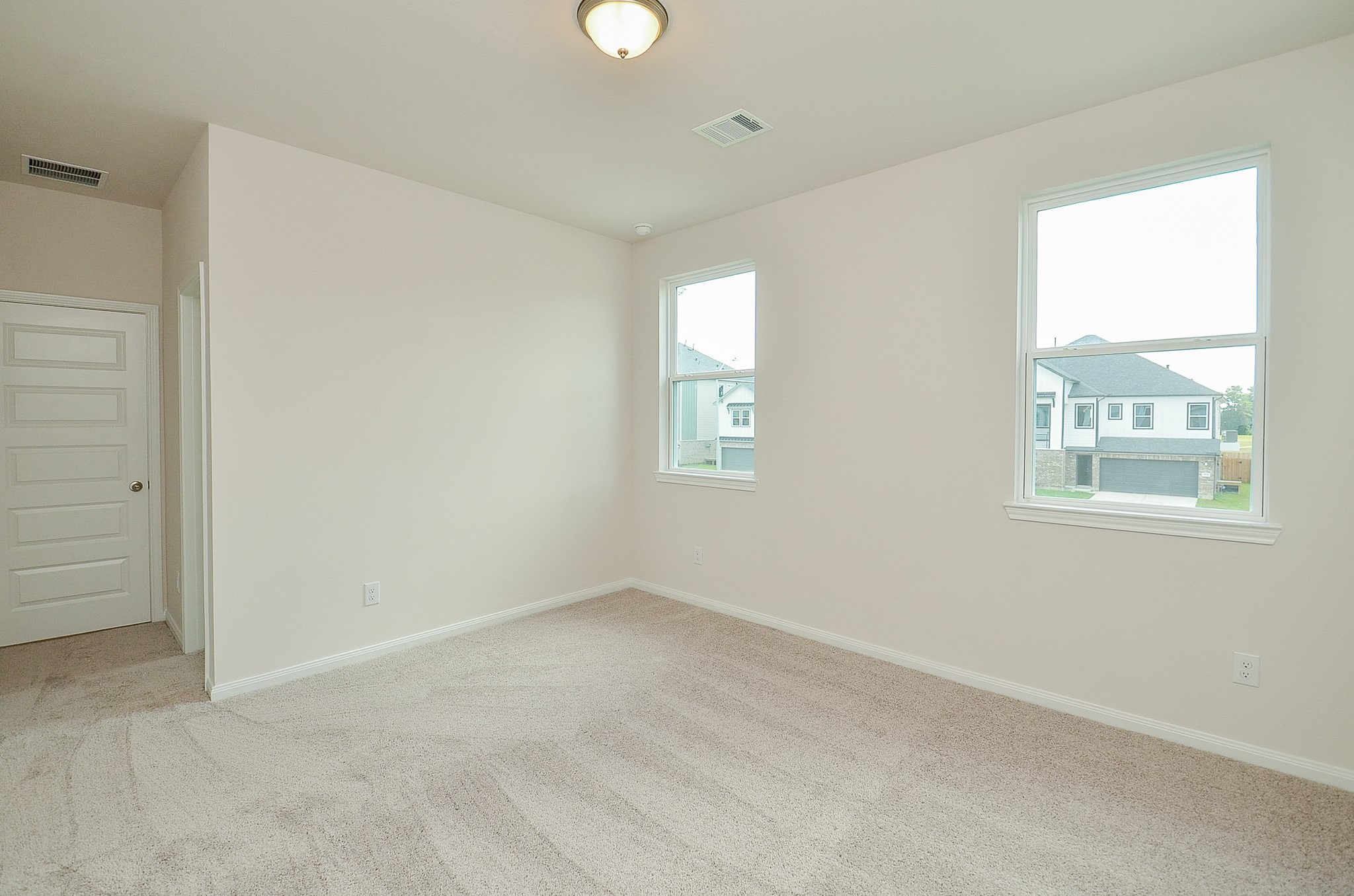 20637 Dynamic Court Humble, TX 77338 - Photo 24 of 32 an empty room with windows