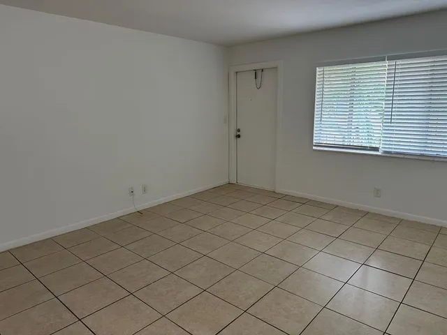 an empty room and mirror