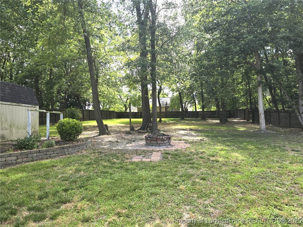 175 Briar Haven Court Raeford, NC 28376 - Photo 37 of 44 a view of a yard with a tree