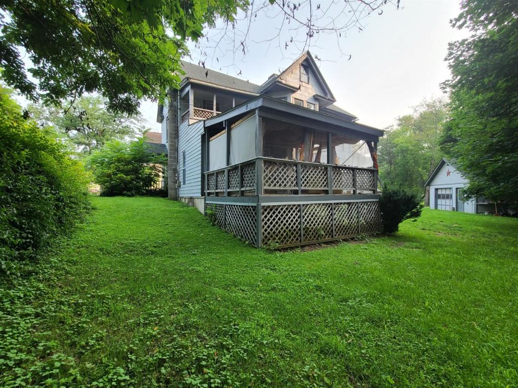 49 Bridge Street Sidney, NY 13838 - Photo 12 of 52 Downstairs apartment deck/porch off master bedroom