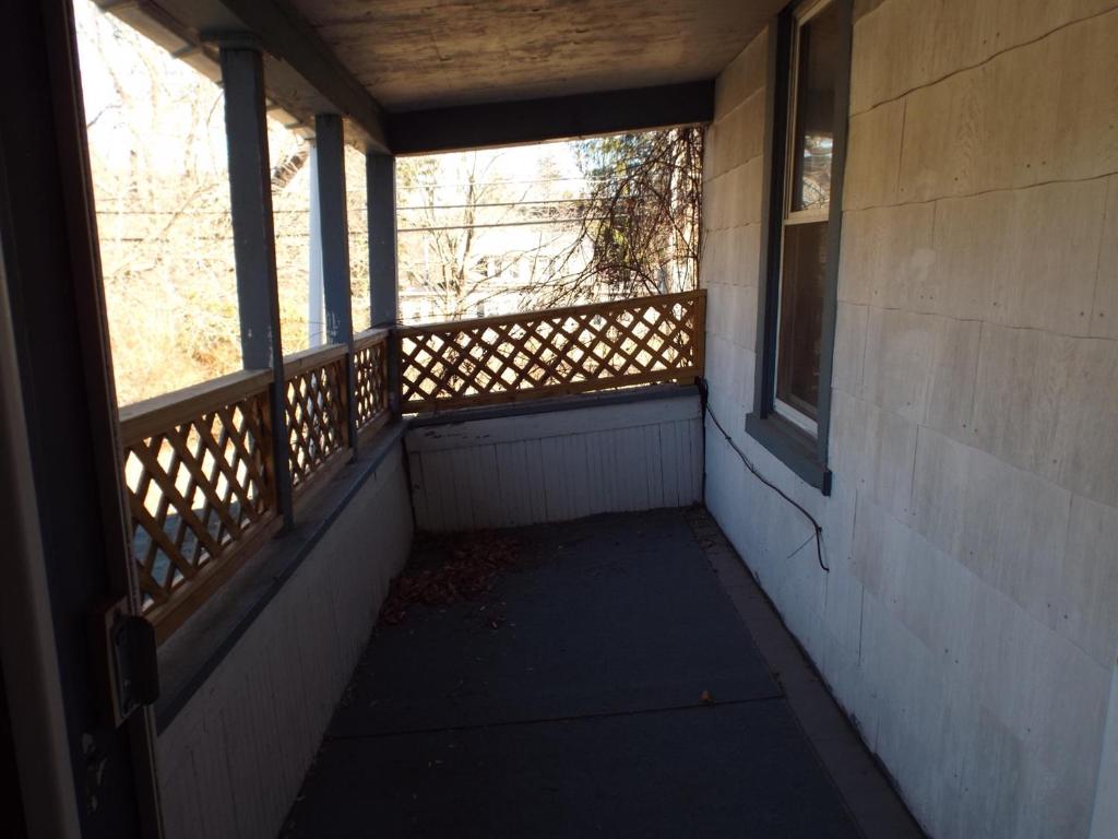 49 Bridge Street Sidney, NY 13838 - Photo 25 of 52 Porch off living room in upstairs apartment.