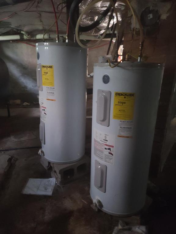 49 Bridge Street Sidney, NY 13838 - Photo 32 of 52 Water heaters/basement.