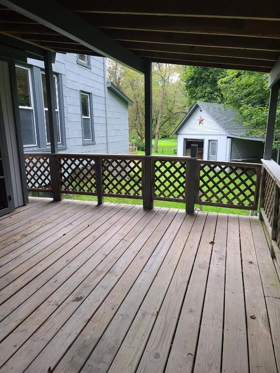49 Bridge Street Sidney, NY 13838 - Photo 38 of 52 Downstairs apartment deck off master bedroom
