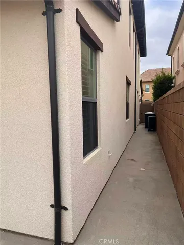 a view of the house with a large window