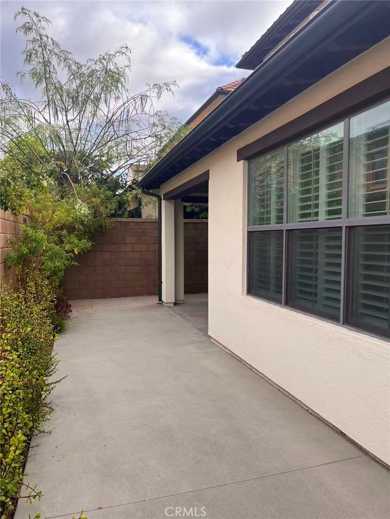 119 Alumroot Irvine, CA 92620 - Photo 31 of 35 a view of the house with a large window