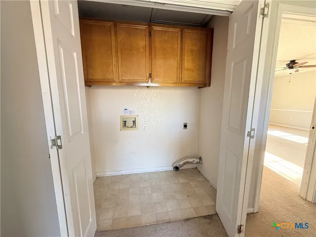 a bathroom with a tub and mirror