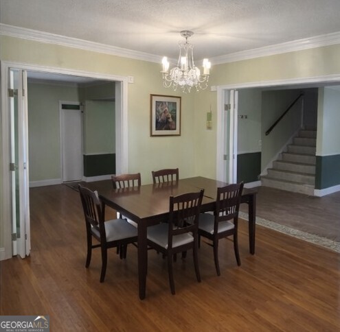 13 Marshall Street Butler, GA 31006 - Photo 11 of 27 a view of a dining room with furniture and wooden floor
