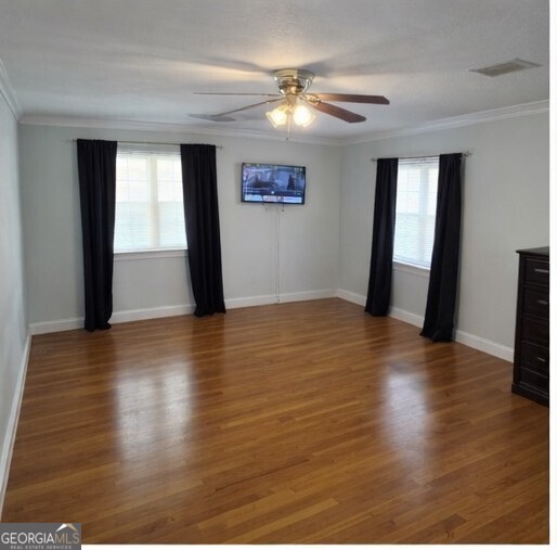 13 Marshall Street Butler, GA 31006 - Photo 13 of 27 a view of a room with wooden floor and window