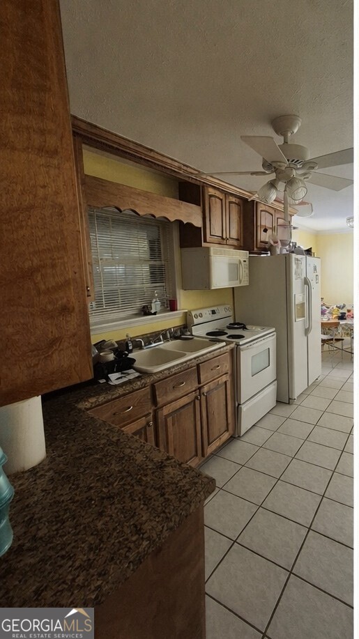 13 Marshall Street Butler, GA 31006 - Photo 17 of 27 a kitchen with a sink and cabinets