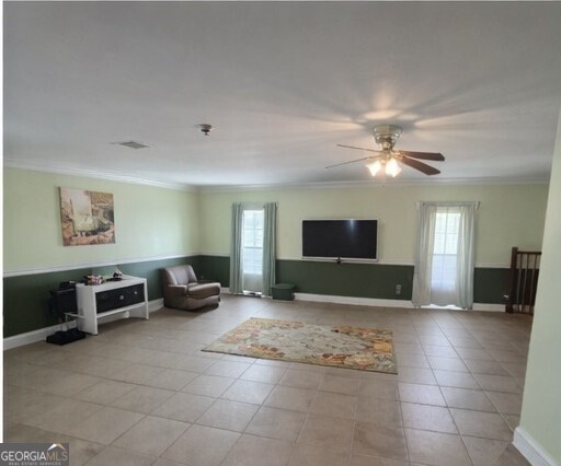 13 Marshall Street Butler, GA 31006 - Photo 22 of 27 a living room with furniture and a flat screen tv