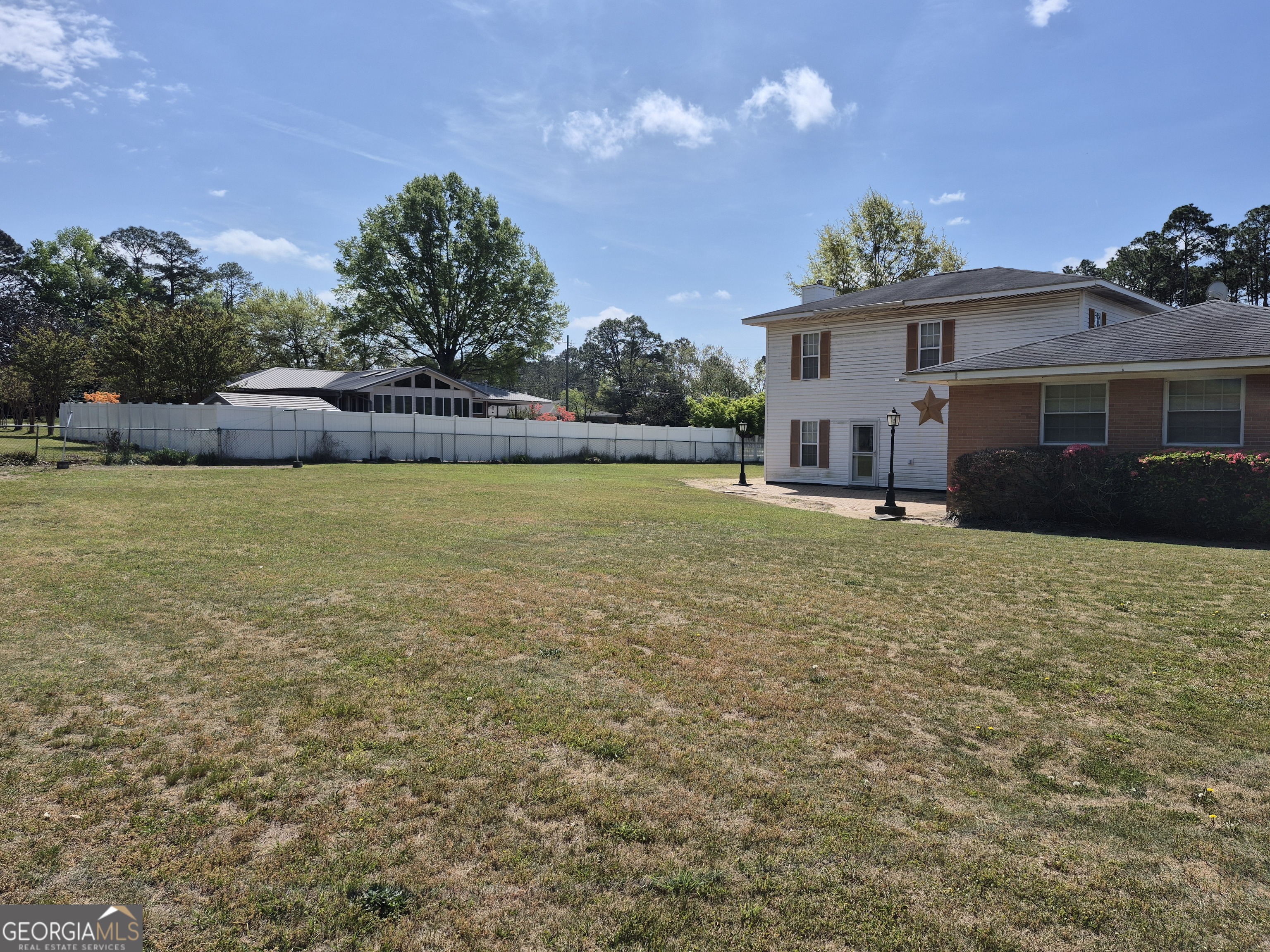 13 Marshall Street Butler, GA 31006 - Photo 6 of 27 a view of a house with a yard