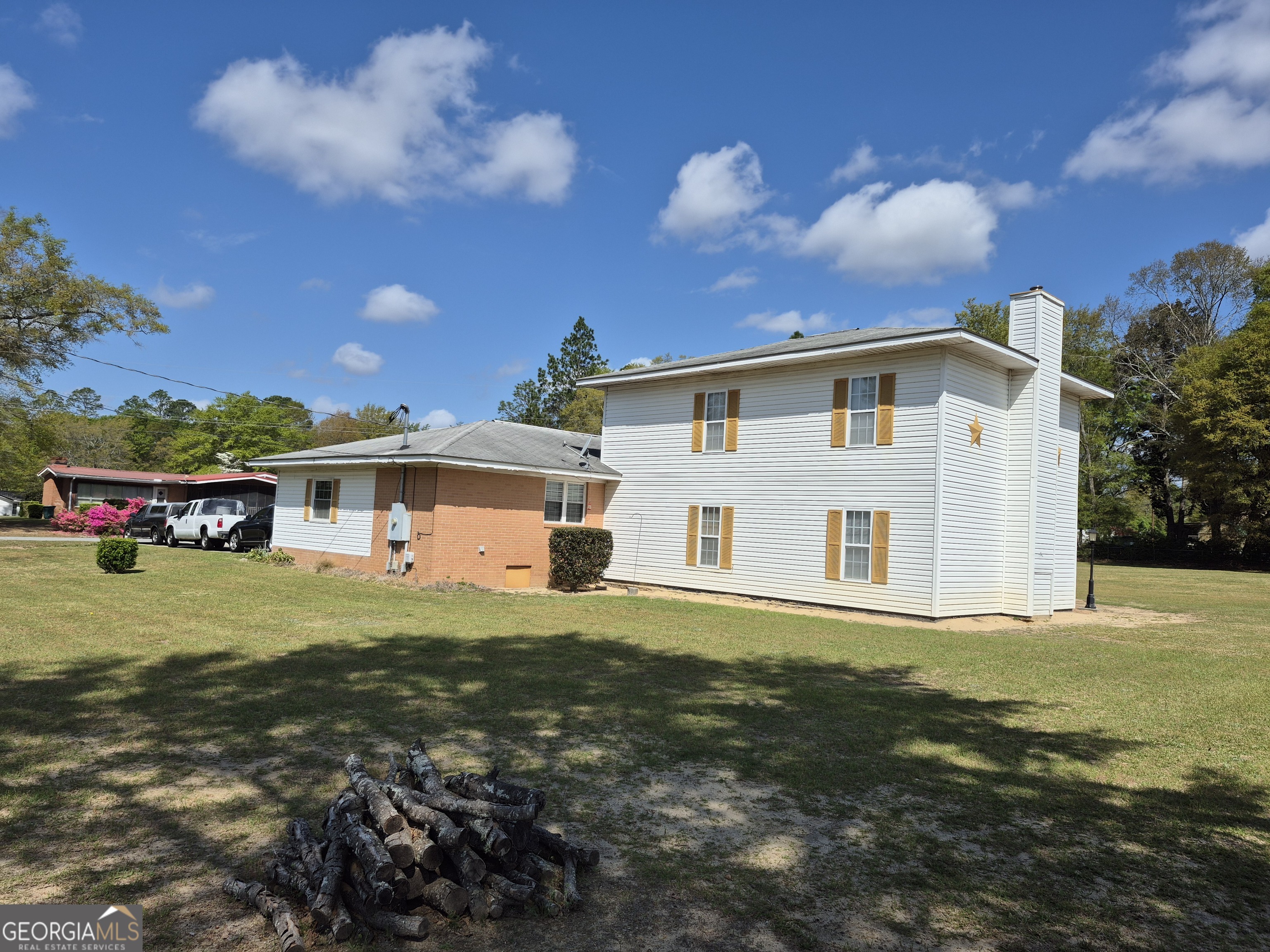 13 Marshall Street Butler, GA 31006 - Photo 8 of 27 a front view of a house with a garden
