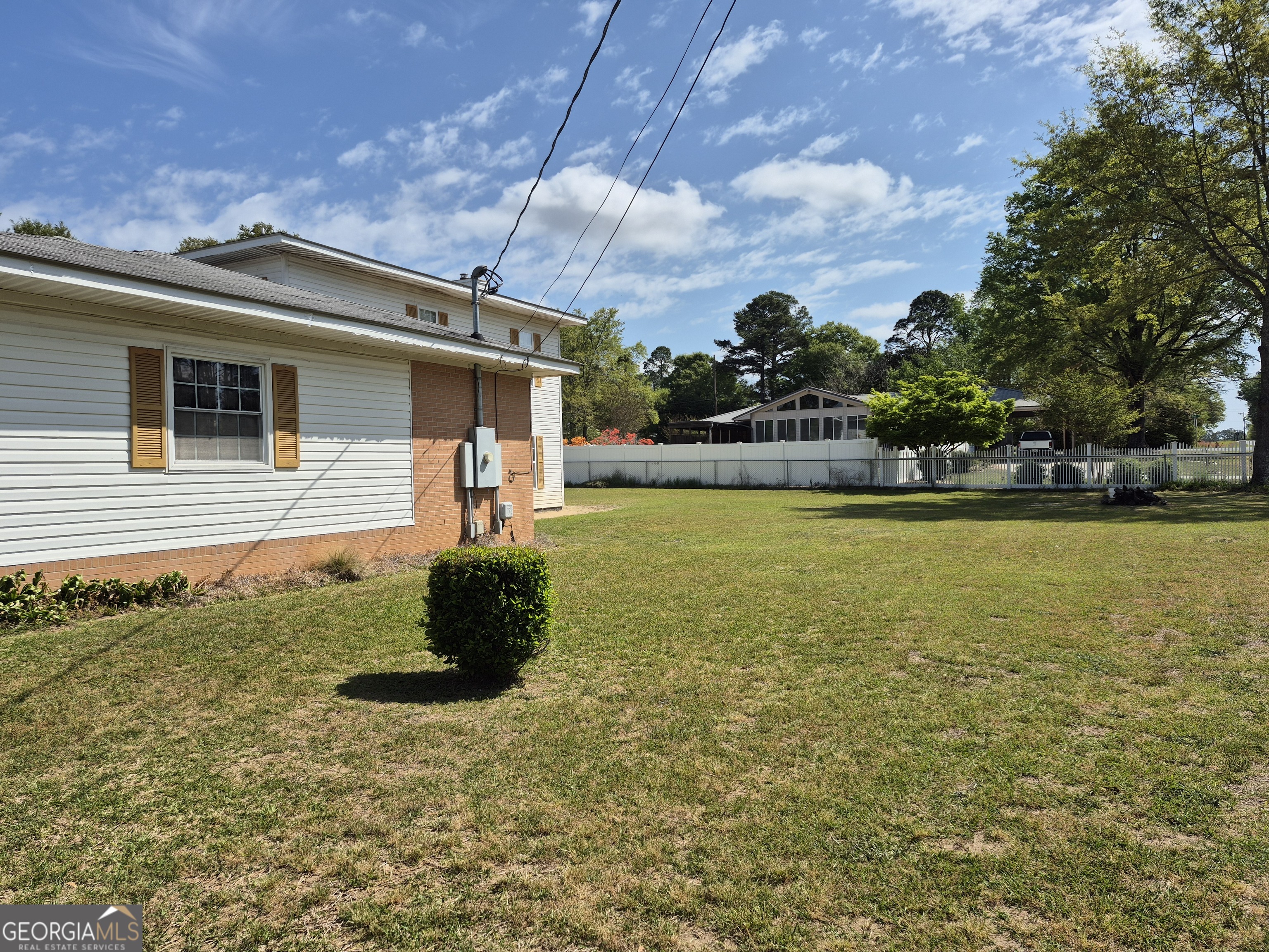 13 Marshall Street Butler, GA 31006 - Photo 9 of 27 a front view of a house with a yard