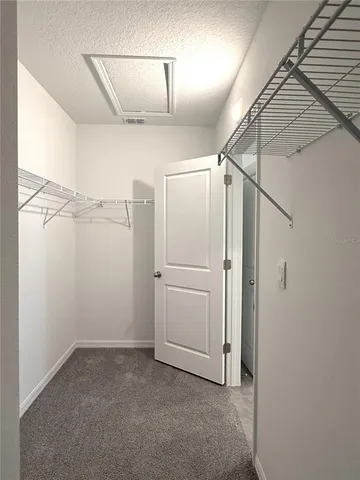 a view of a room with an empty space