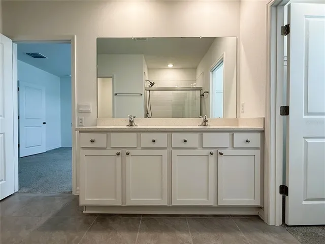 view of a bathroom with mirror