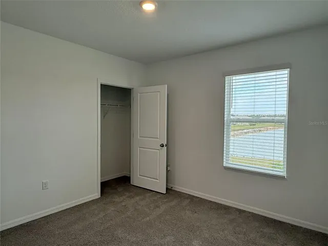 an empty room with windows