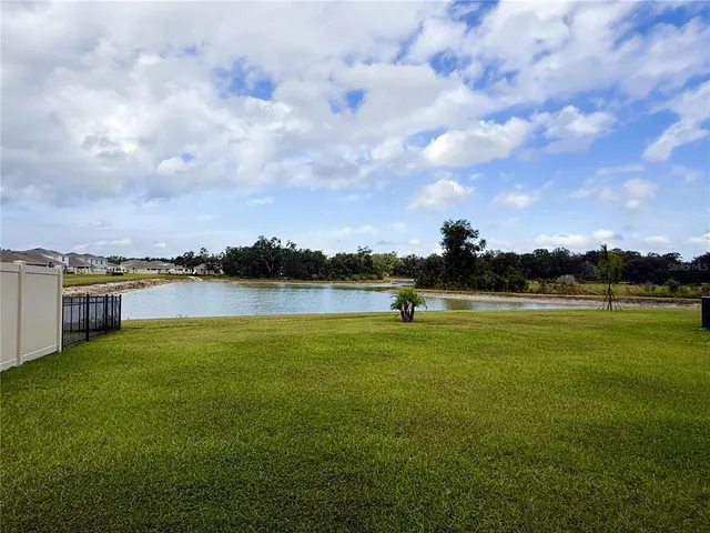 a view of a lake from a yard