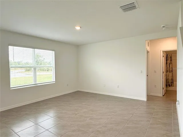 an empty room with a window