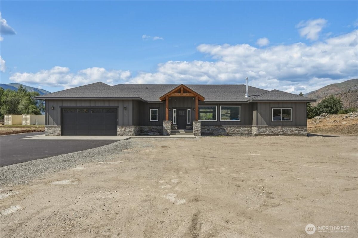 110 Slide View Lane Manson, WA 98831 - Photo 5 of 38 front view of a house with a outdoor space