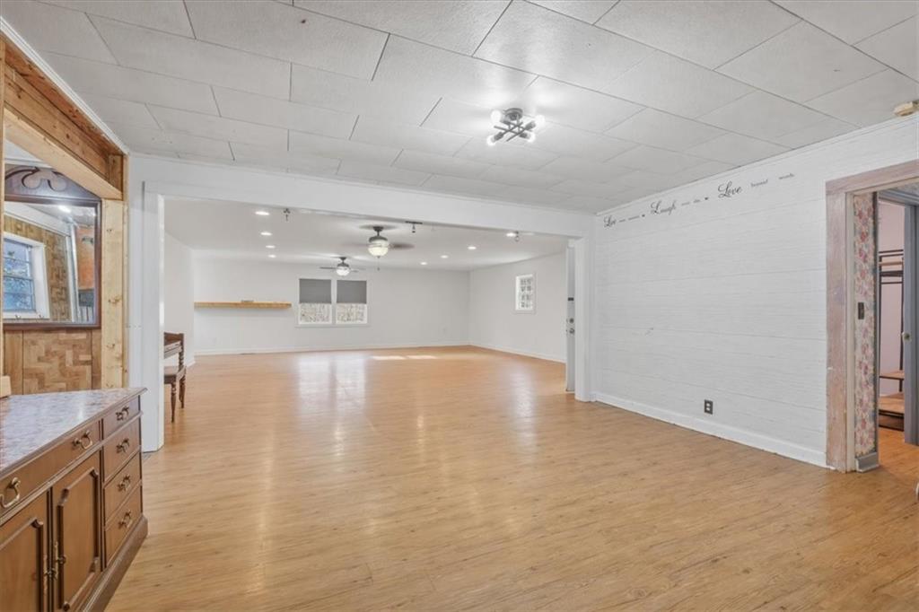 1491 Booze Mountain Road Silver Creek, GA 30173 - Photo 11 of 41 a view of empty room with wooden floor