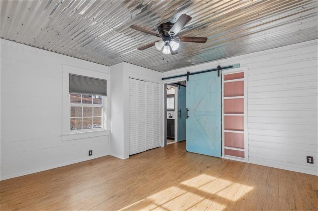 1491 Booze Mountain Road Silver Creek, GA 30173 - Photo 22 of 41 a view of an empty room with a window