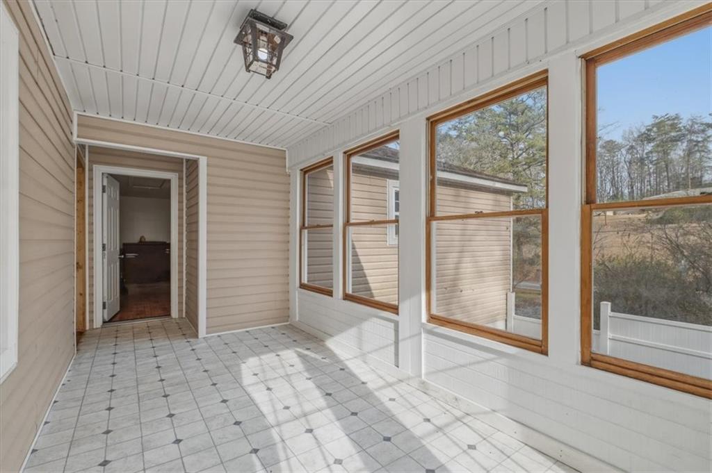 1491 Booze Mountain Road Silver Creek, GA 30173 - Photo 24 of 41 a view of a room with a large window
