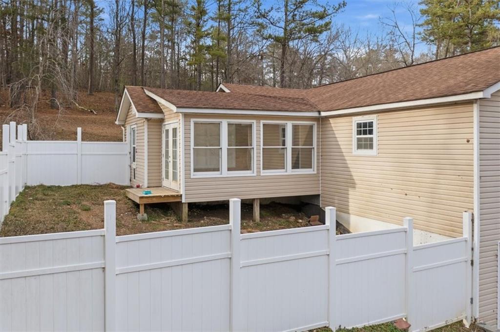 1491 Booze Mountain Road Silver Creek, GA 30173 - Photo 31 of 41 a front view of a house with a yard