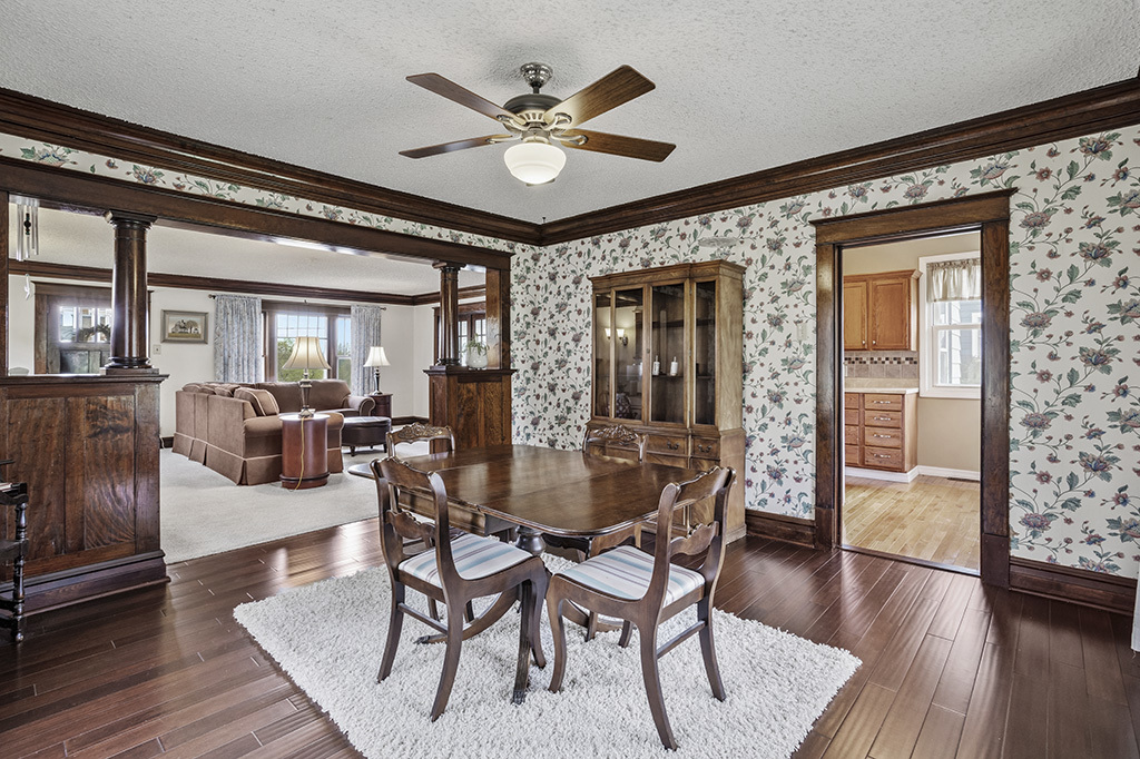 302 East Division Street Lemont, IL 60439 - Photo 15 of 26 a dining room with furniture a chandelier and wooden floor