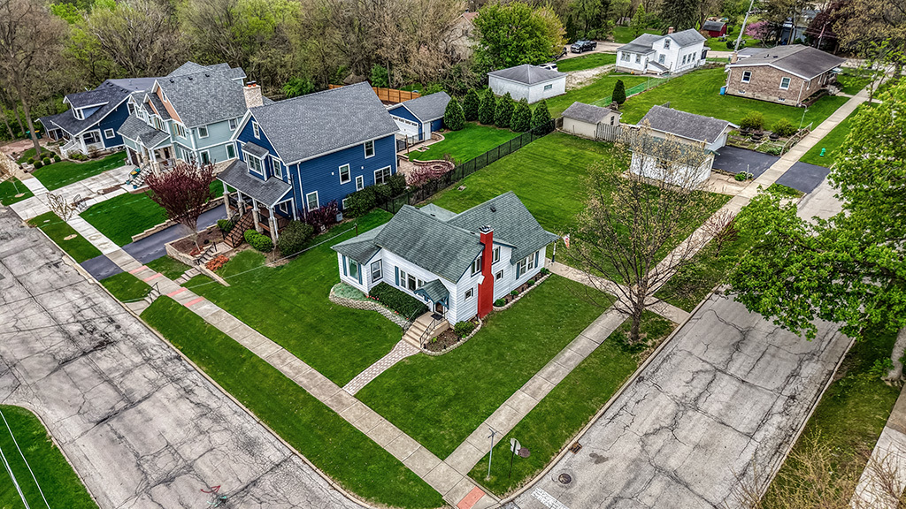 302 East Division Street Lemont, IL 60439 - Photo 3 of 26 an aerial view of a house with garden space and street view