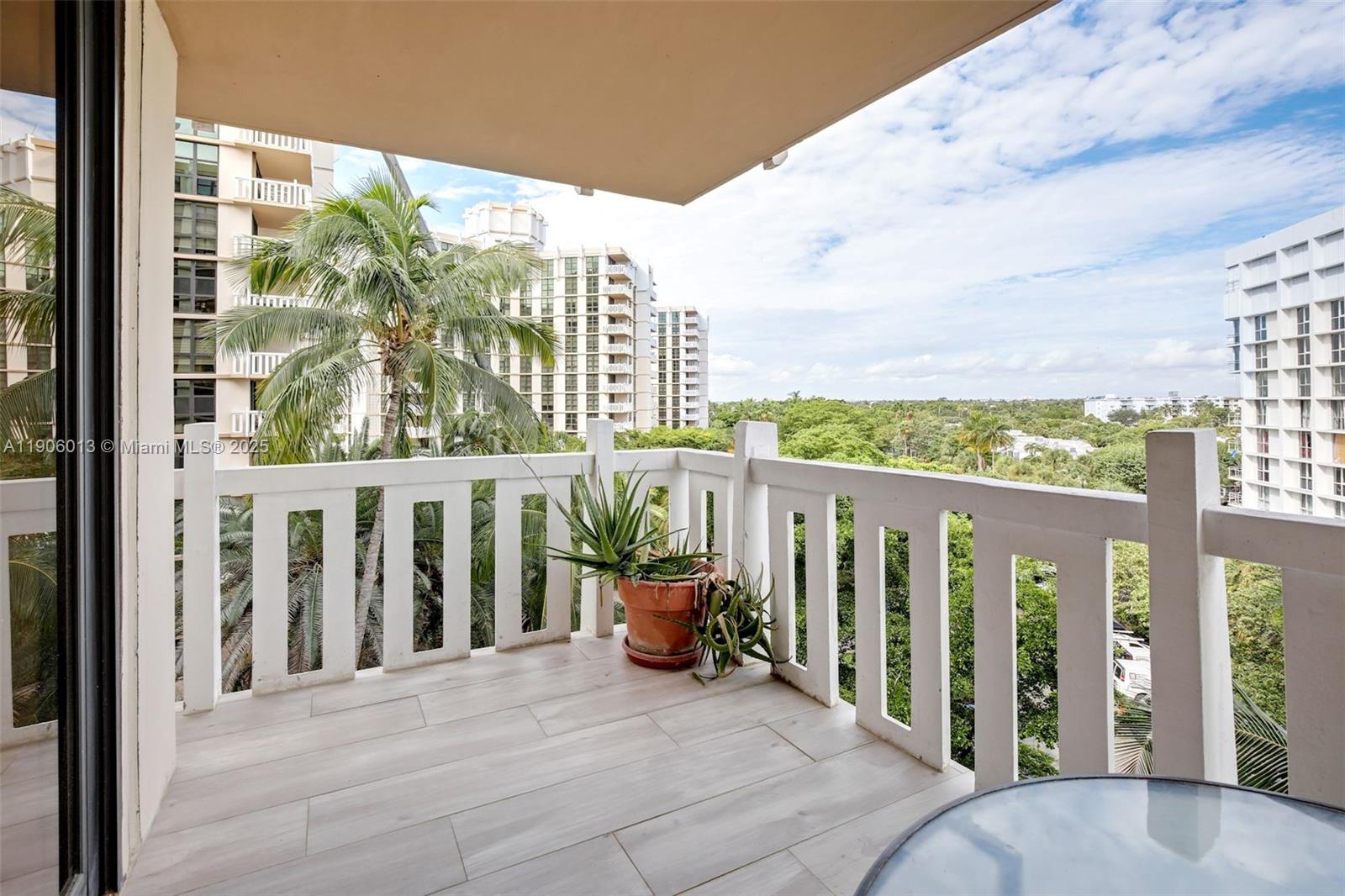 1111 Crandon Boulevard, Unit A507 Key Biscayne, FL 33149 - Photo 14 of 23 a balcony with street view