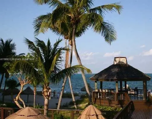 a view of outdoor space with swimming pool and furniture