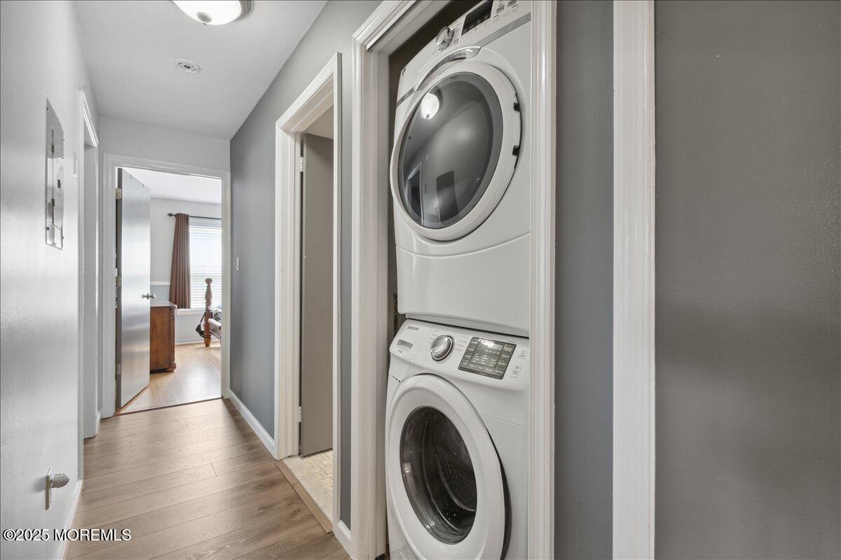 425 Winterberry Court Howell, NJ 07731 - Photo 11 of 17 a view of a hallway with washer and dryer