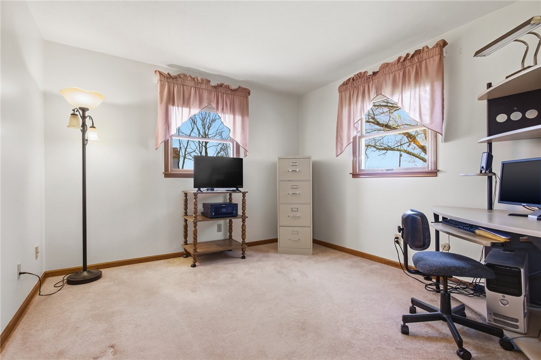 6718 Old Columbus Road South Vienna, OH 45369 - Photo 21 of 33 This spacious room with abundant natural light offers versatile living options.