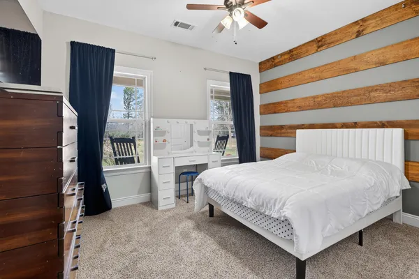 a kitchen with stainless steel appliances a stove sink and cabinets