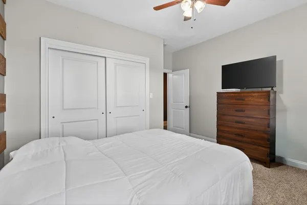 a kitchen with granite countertop a stove and a sink