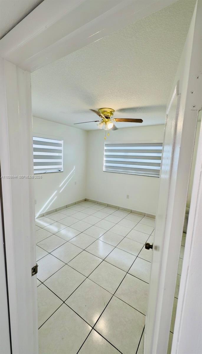 6070 West 19th Avenue, Unit 307 Hialeah, FL 33012 - Photo 11 of 19 a view of a room with windows